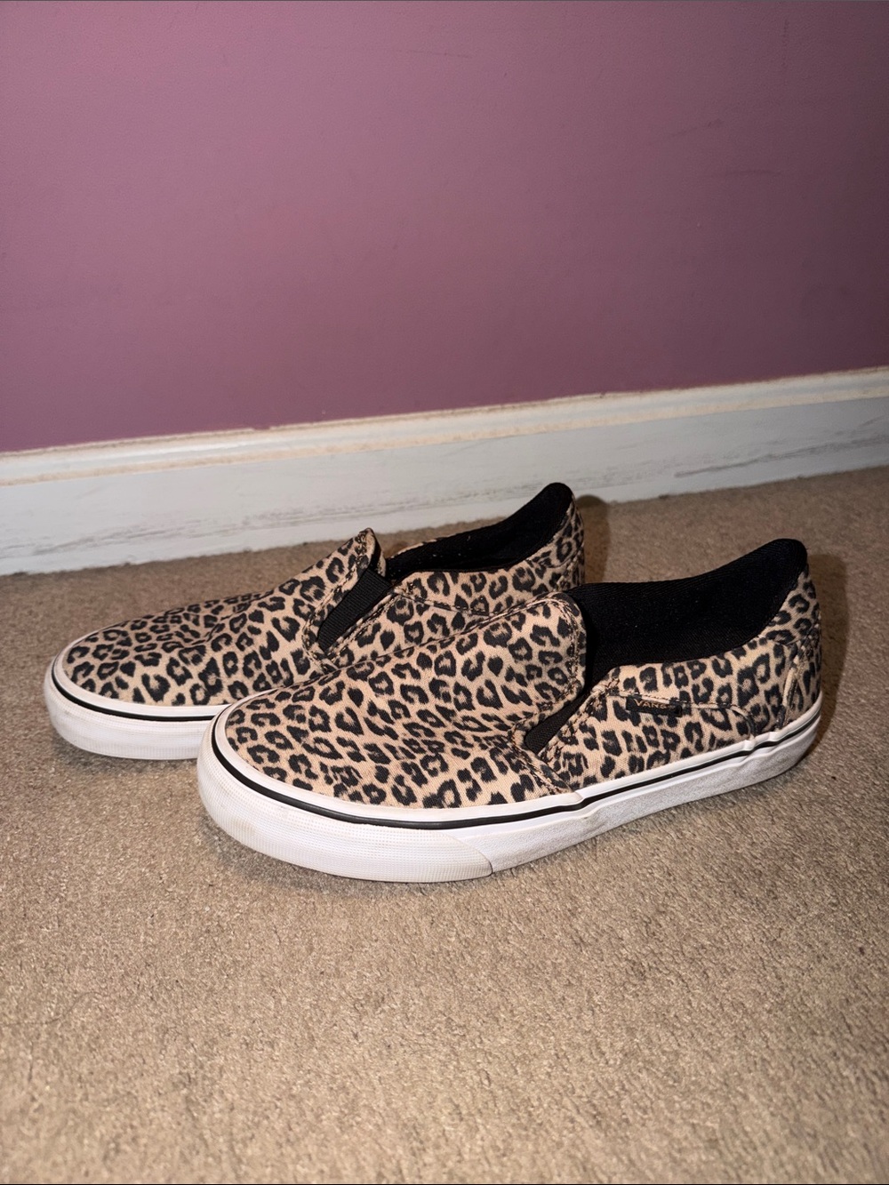 Vans Slip-On Sneakers in Leopard Tan and Black